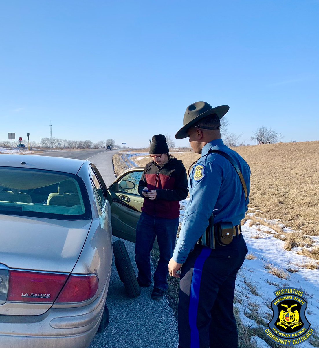 MSHPRecruiting's tweet photo. After leaving a recruiting event at @UCMPA Trooper Daniels had the opportunity to assist a stranded motorist with a flat tire and help him get back on his way safely. #servicefirst #serviceandprotection #duty #professionalism @MSHPTrooperGHQ https://t.co/mIQ4tplRhI