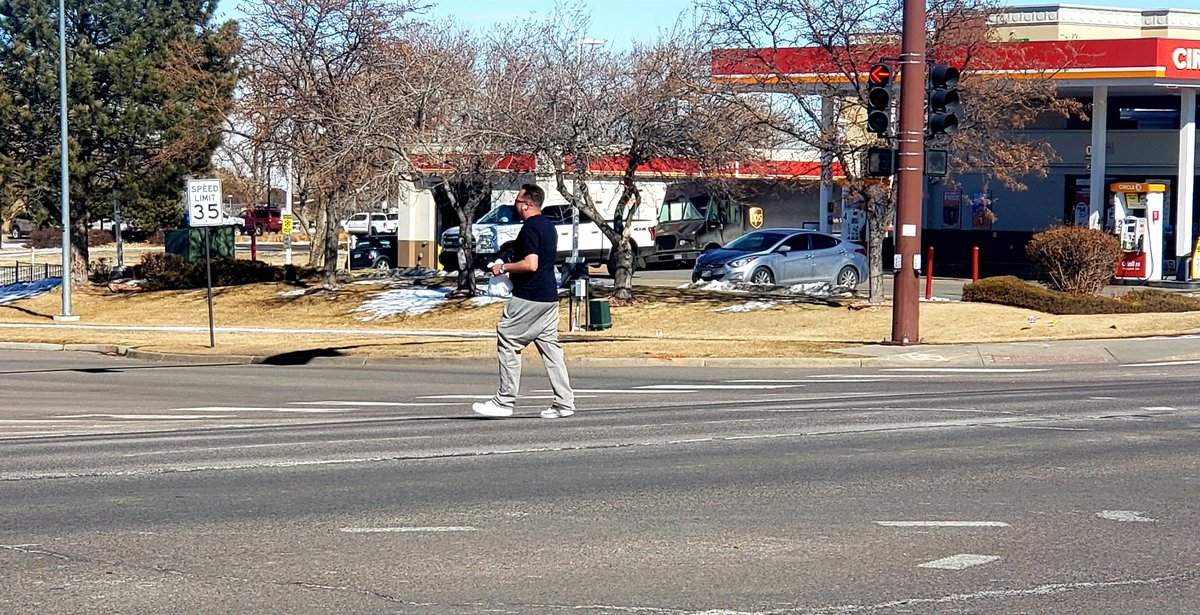 OneEarOut's tweet image. This man is crossing a street diagonally while dodging traffic and dancing to the music playing on his earbuds. It was hard to watch. Please don't do this. #TuneInToLife #OneEarOut