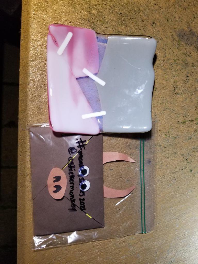 CStickermonkey's tweet image. A glass artist from Camas WA sent this fused glass piece to join in on #monkeyshines2021 fun! She would love to know who finds it.