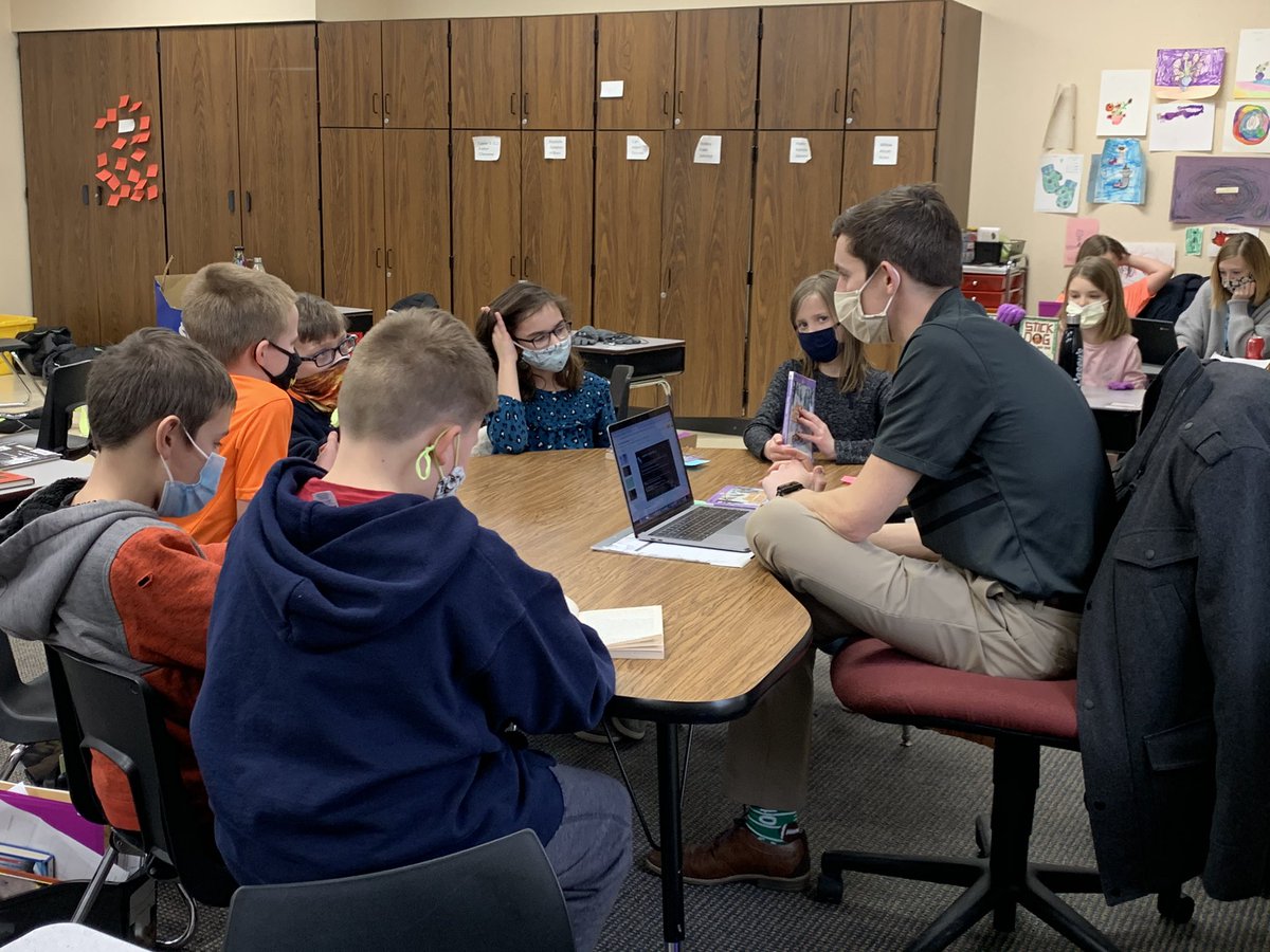 ProfJBock's tweet image. Colt Arthur leads a small group while student teaching at Waterloo Elementary.
