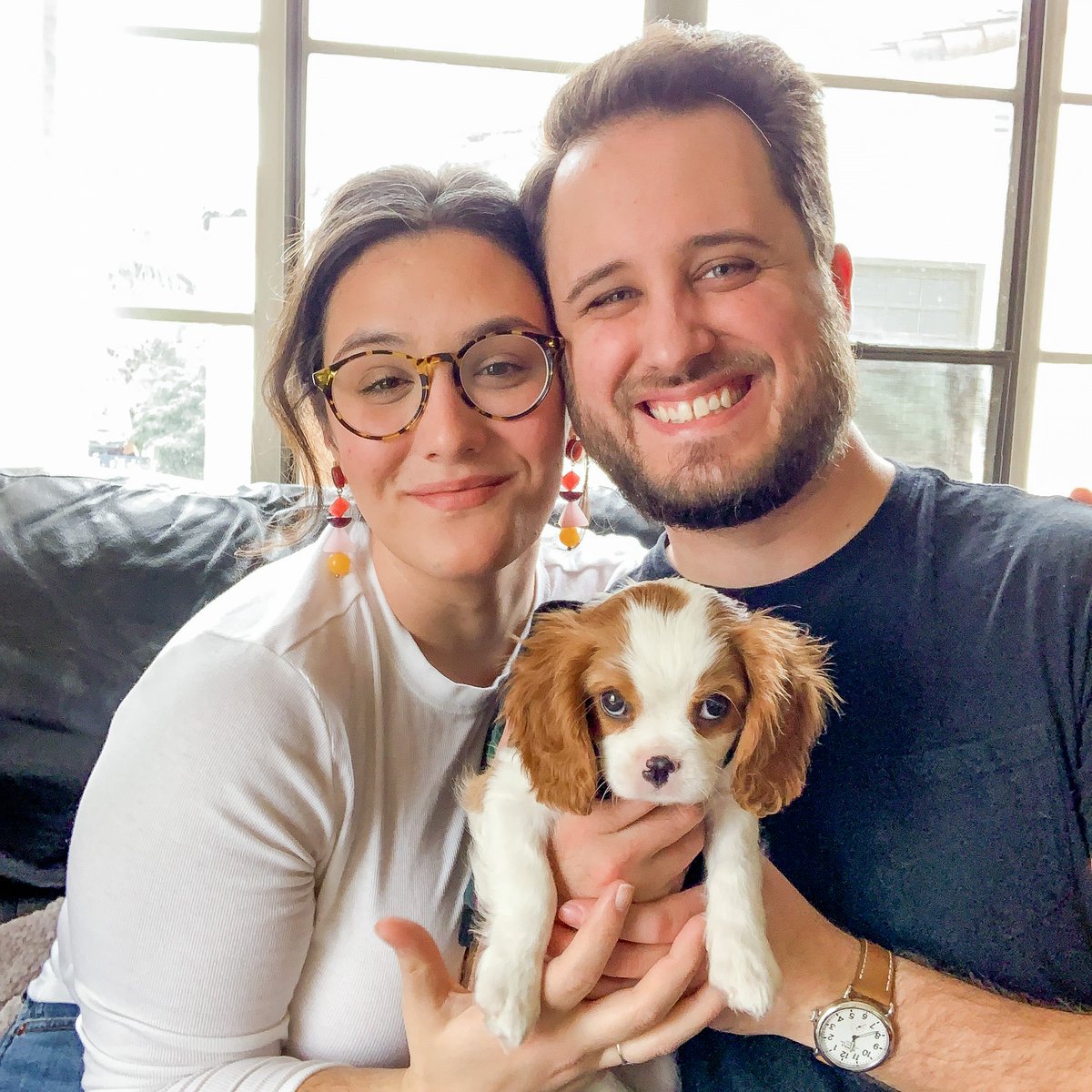 OperaSanJose's tweet photo. Our Resident Artists Ashley Dixon and Carlos Enrique Santelli have a new roommate: introducing Mochi the Cavalier King Charles spaniel! Everyone at OSJ has been gushing about this adorable bundle of joy - help us welcome him to the Opera San José family! #operadogs #operalife https://t.co/IPW1rzyGDA