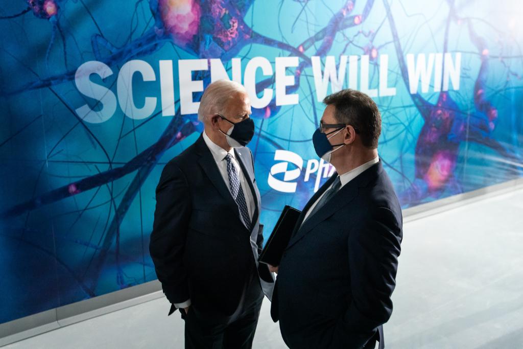 President Biden talks with the CEO of Pfizer after tour the plant