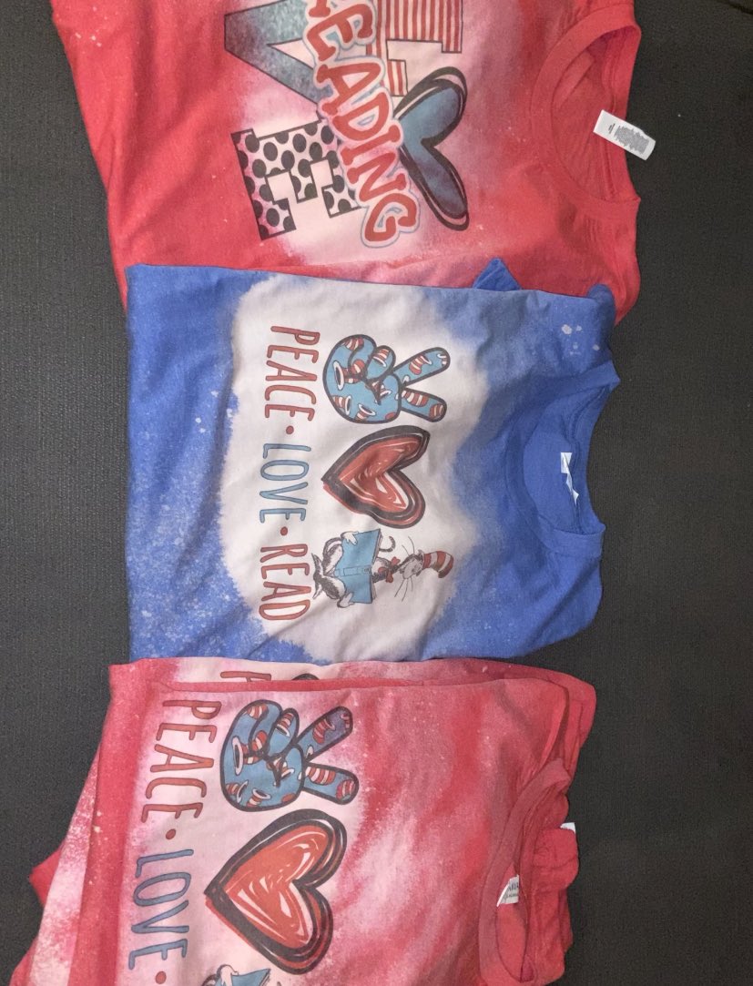 JanelHabosha's tweet photo. We have been busy making Dr Seuss shirts! We have a few extra ready to ship or pick up! See picture of sizes! St Patrick shirts coming up next! #teachertwitter #T-shirt #DrSeuss #becreativewithB #lovereading #peaceloveread โ๏ธโค๏ธ๐ https://t.co/shkYI1EI87