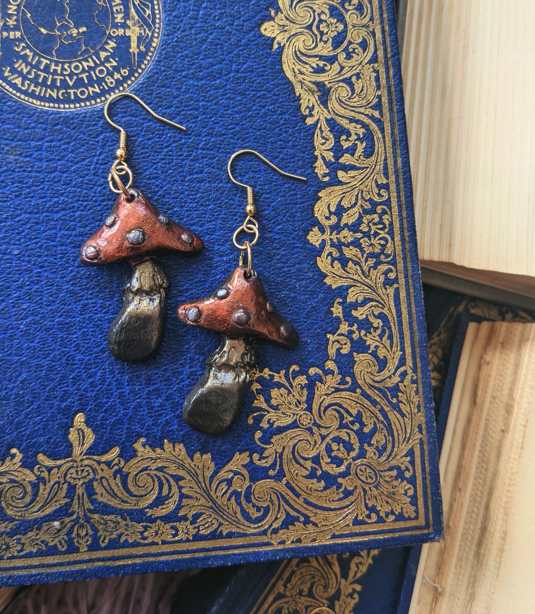 eurythmik's tweet photo. Mushroom Earrings 🍄 I named them "Esther" and "Famine" ready to ship! https://t.co/Ak5a4kbmdq