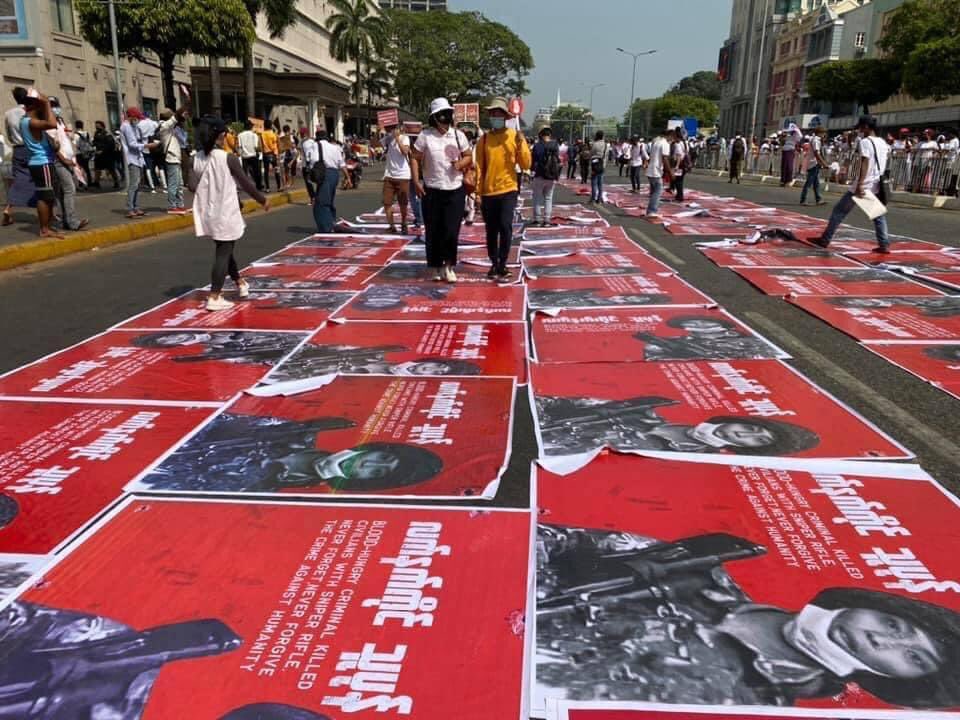 Vinyls of sniper soldier from Mandalay incident seen being spread on Sule Road on 22 Feb, people calling it social punishment. At least two died from security forces brutal crackdown. 
#WhatsHappeninglnMyanmar 
#22222Revolution