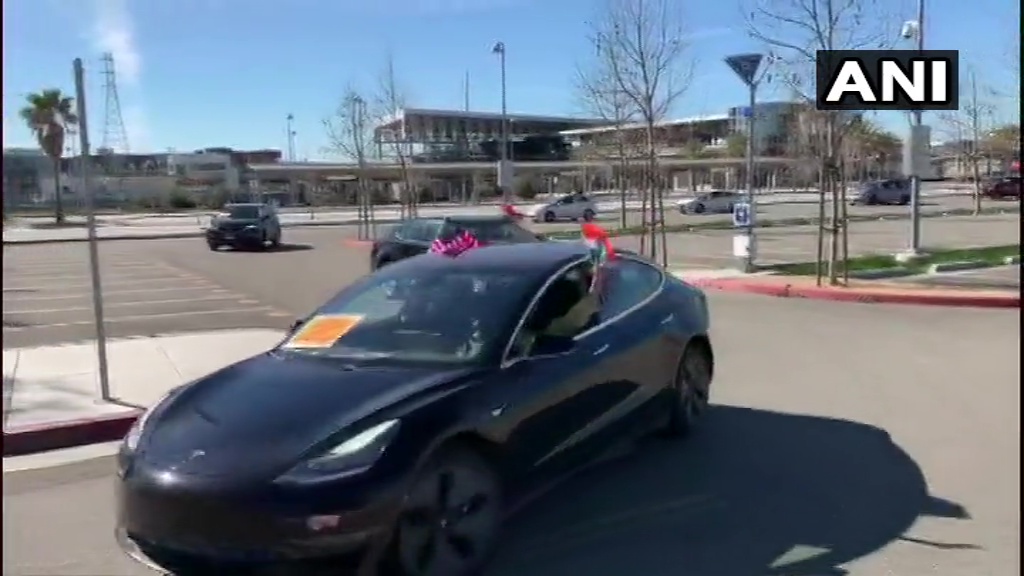 ANI's tweet image. USA: NRIs of the San Francisco Bay Area organised a car rally on 21st February, in support of the Government of India's new Farm Laws