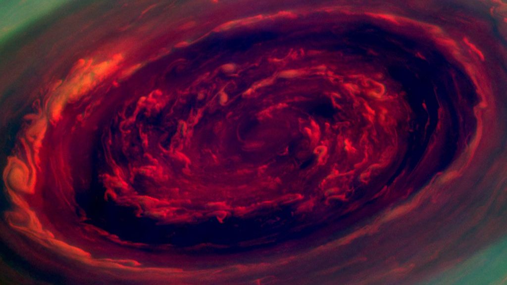 На какой планете самый большой атмосферный вихрь. Шестиугольный Вихрь на Сатурне. Ураган на Сатурне. Вихрь Гексагон на Сатурне. Ураган шестиугольник на Сатурне.