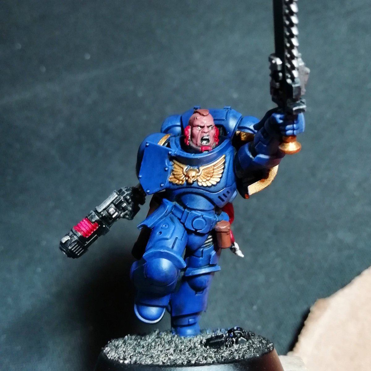 #hobbystreakday70

Tried highlighting the leather pouches, the face and the helmet.
Also attempted the plasma gun, but I realised I probably need to go brighter red instead oh just adding white.
Also did the eyes, hilarious attempt but it'll do!