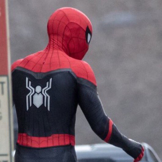 ITS THE BLACK AND RED SPIDERMAN SUIT
