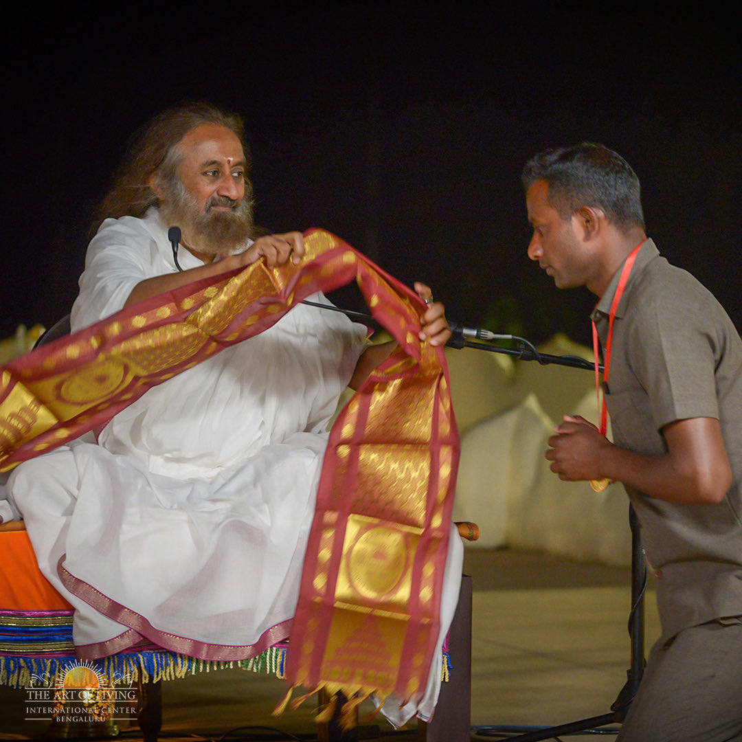 Meet the #RealLifeHero Shri Ashok Kumar- our Head Guard who saved a woman from the nearby village while she was attempting suicide by jumping in the lake.

Gurudev <a href="/SriSri/">Gurudev</a> later met with the lady &amp; her family. She learnt Sudarshan Kriya &amp; is now leading a happy &amp; fulfilling life.