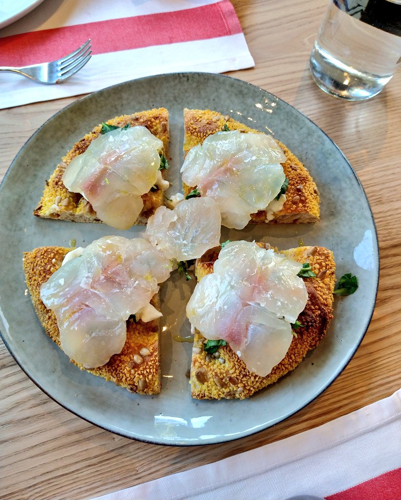 emmabentley87's tweet photo. Tomorrow we go back to orange level lockdown so this was our last meal out for a while. Dentex fish carpaccio on a sourdough corn pizza base, accompanied by a rosé from Strohmeier. #ITigli https://t.co/5hnuexucfC