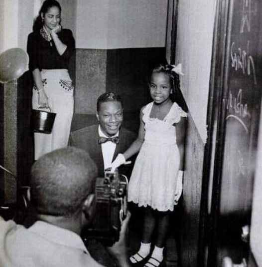 woofknight's tweet image. Maria Cole stands by patiently while husband, Nat King Cole poses with Singer Gladys Knight age 7, who meets her idol 1953.