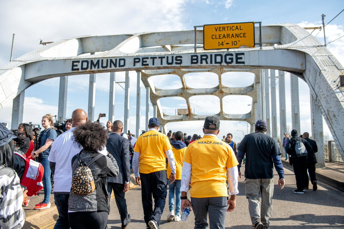 NAACP's tweet image. Today we commemorate the 56th anniversary of #BloodySunday for the first time without our beloved #JohnLewis. Let us use this moment and the memory of the sacrifices made on the #EdmundPettusBridge to fuel our continued fight for equal protection under the law. #Selma56