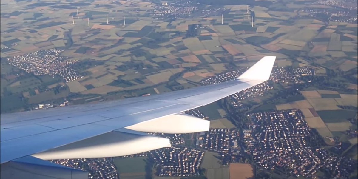 Lufthansa a330 landing In Frankfurt from wing view