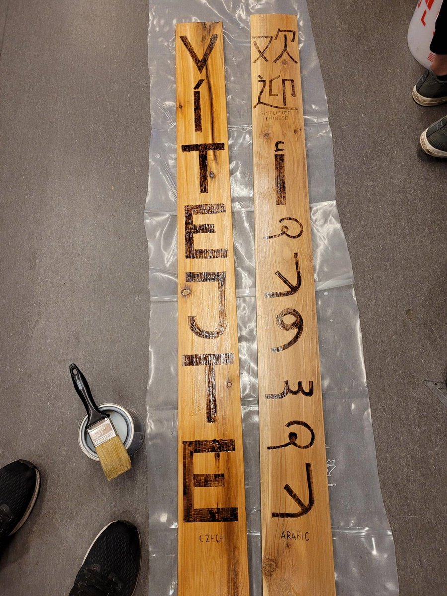 "Welcome" to our outdoor classroom.  Students made signs by wood burning cedar.  We will have signs in over 20 languages spoken by our students and their families in the community. <a href="/sd43bc/">School District 43</a> #ECSfund 
<a href="/Kirsten_SD43/">Kirsten Paterson</a> <a href="/DanielMar785/">Daniel Martin</a>