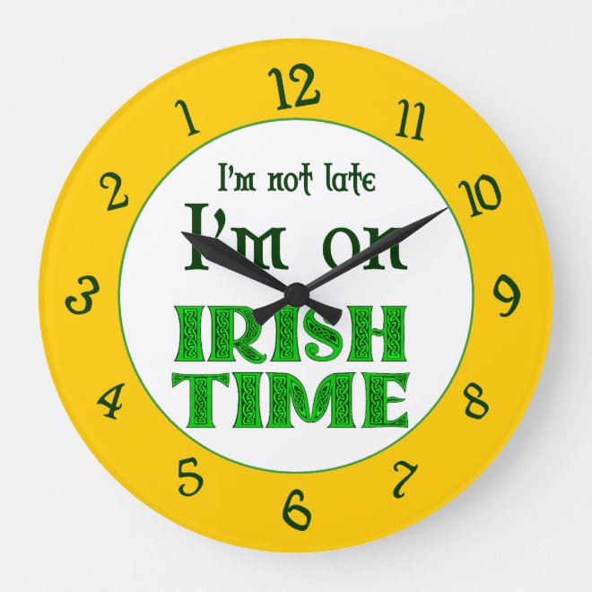 A wall #clock reading “I'm not late, I'm on Irish Time”, with Celtic knotwork letters in green, backwards numbers on an orange background. #IrishTime   ow.ly/1BEY50DicKp