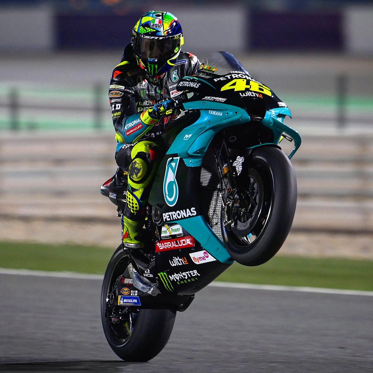 A wheelie contest from the Petronas Yamaha SRT guys. 