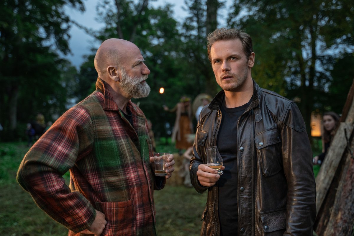 STARZ's tweet photo. Like for @SamHeughan’s leather jacket, Retweet for @GrahamMcTavish’s flannel. Either way, it's time to cozy up with a new episode of @MenInKiltsSTARZ now on the #STARZ App! https://t.co/AiMcvcawe6 https://t.co/BCHGKiPS4z