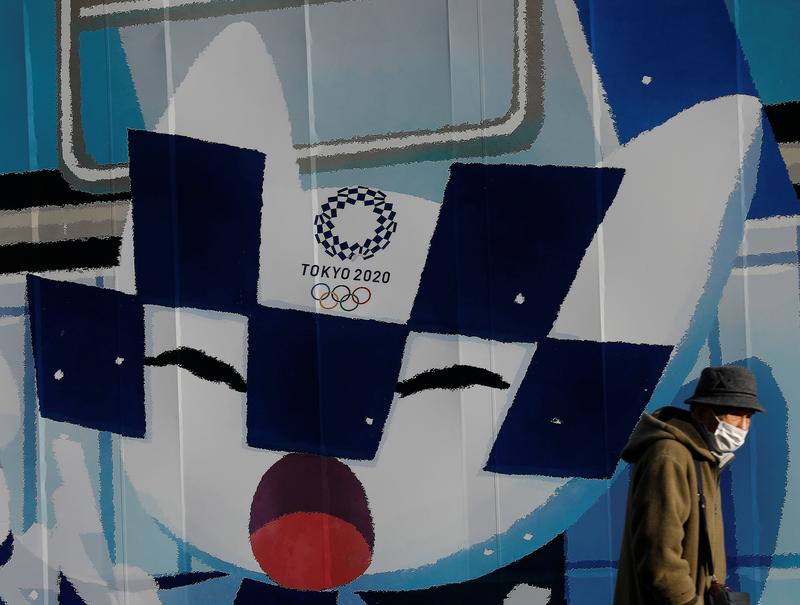 Reuters's tweet photo. Waiting for Tokyo: How 110,000 Olympic volunteers put their lives on hold https://t.co/BaTyfClUPY https://t.co/M5Sra7WGhJ