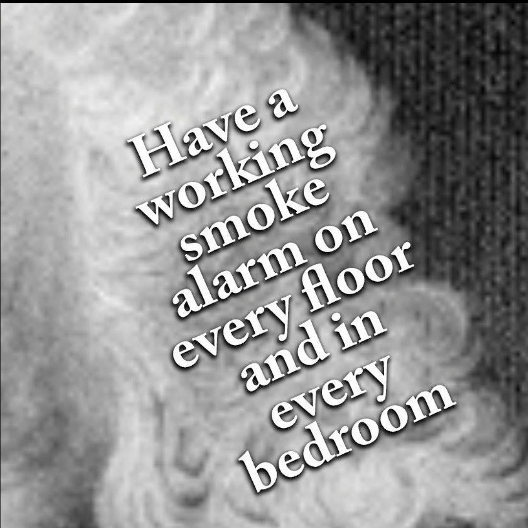 A very very very close up picture of George Washington's hair. The text reads: have a working smoke alarm on every floor and in every bedroom.