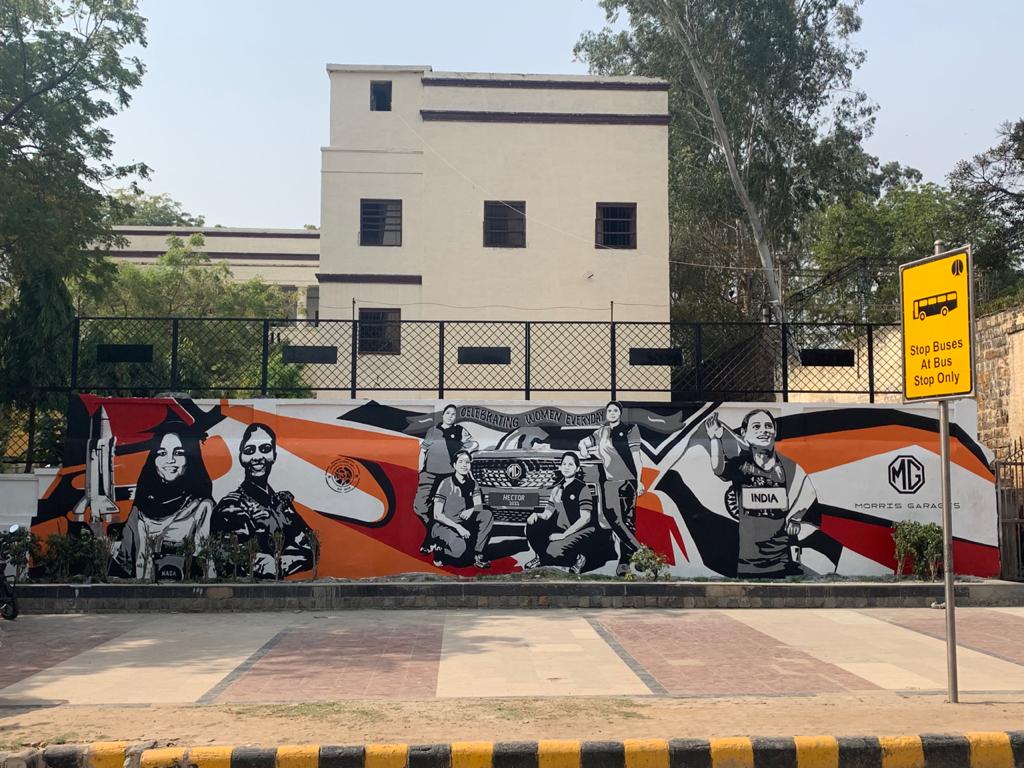 MGMotorIn's tweet photo. Art reflects life! We are elated to showcase our Women's Day mural art at Harcourt Butler School in Gole Market. At MG, we celebrate women everyday and #NotJustForADay
@delhistreetart https://t.co/ujrY9VwpSt