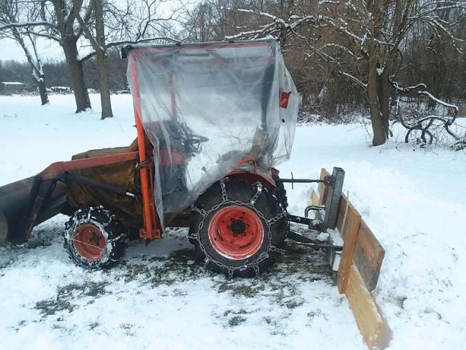 FarmShow's tweet photo. It isn’t fancy, but it takes care of the snow and I can work in comfort, says Doug Kalnbach, Nashville, Mich., about his Kubota B 6100 14 hp., 4-WD tractor fitted with a 10-ft. wood snow blade and a #shower curtain cab. #snowplow #snowblade #tractor #cab https://t.co/HgPFSukpgy https://t.co/LIX2pMh5fU