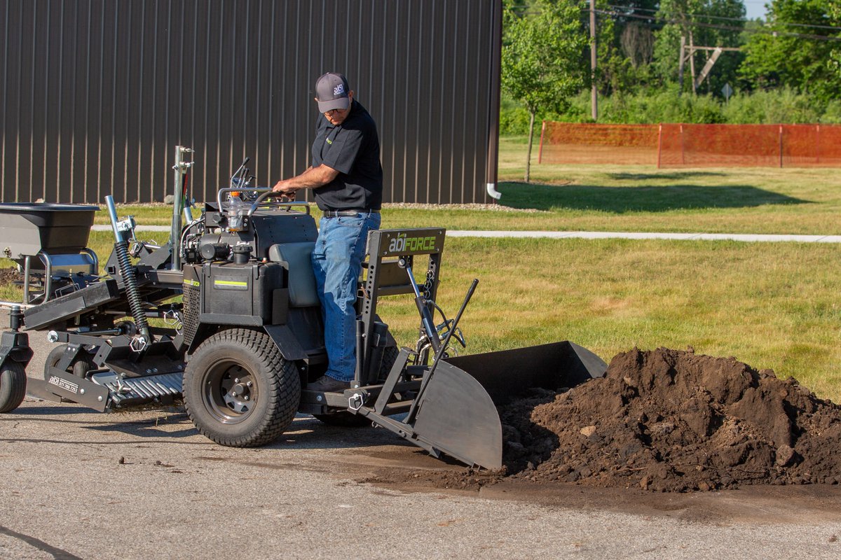 ABIattachments's tweet photo. No need for a wheelbarrow if you have an ABI Force with rear Scoop! With its hydraulic lift system and electric actuated dump and retraction ability, the Scoop can carry up to 100 pounds of mulch or soil and place it right where you want it. #ABIAttachments #ABIForce https://t.co/GyUo0kGFAu