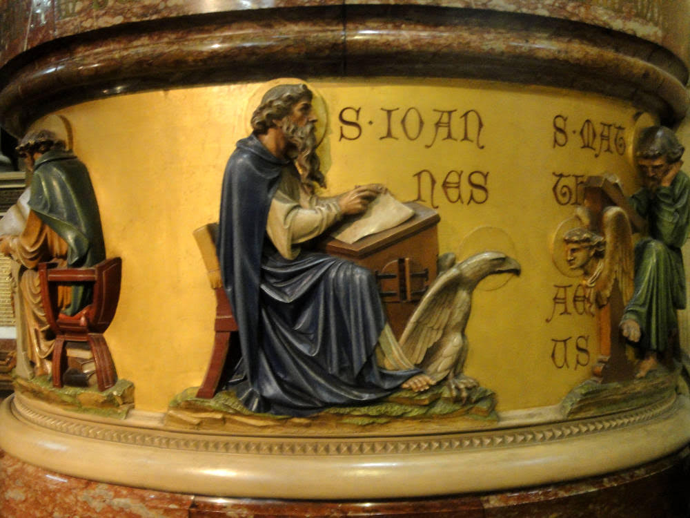 VictorianWeb's tweet photo. #BooksInChurches St John writing his gospel (on the pulpit of St Fin Barre's Cathedral, Cork) to the design of William Burges. "In the beginning was the Word..." https://t.co/Tmq01rmlao https://t.co/goKa7PZGGd