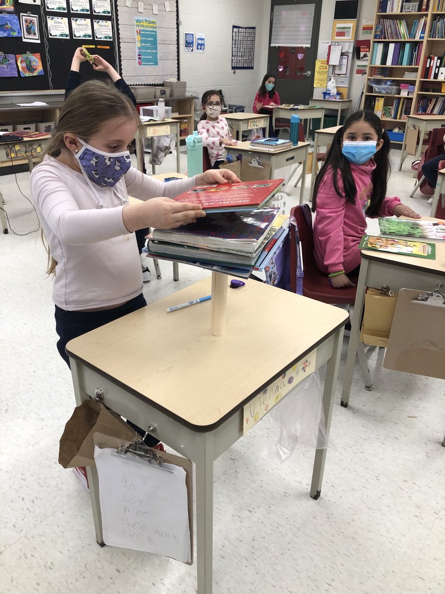 mrs_arcella's tweet photo. How many books can this structure hold? Grade 3s are experimenting and exploring stability in structures. So far we have 17 books.  One student at home stacked 49 books!  ⁦@FFMcGinnCES⁩ https://t.co/3T2qiHdaIM