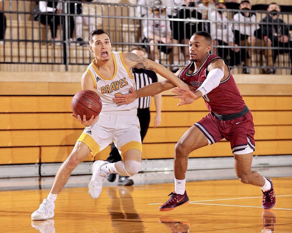 OttawaU's tweet photo. Wilson Field House is electric as your Braves hold a 49-48 lead at halftime of the #KCACMBB quarterfinal game against Sterling College. Second half under way. Go Braves! #OttawaU #BravesNation #KCACTournament https://t.co/ZeCcjpUceh
