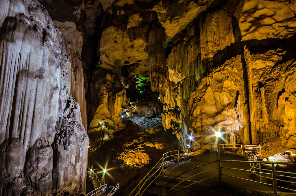 We're going spelunking tonight to Tempurung Cave in the state of Perak in Malaysia. It's more than 3 km long (just under 2 miles), which makes it one of the longest caves on the Malaysian Peninsula. There has been lights and walkways installed in some areas of the cave.