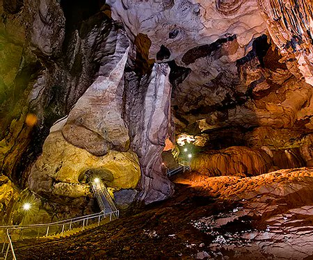 We're going spelunking tonight to Tempurung Cave in the state of Perak in Malaysia. It's more than 3 km long (just under 2 miles), which makes it one of the longest caves on the Malaysian Peninsula. There has been lights and walkways installed in some areas of the cave.