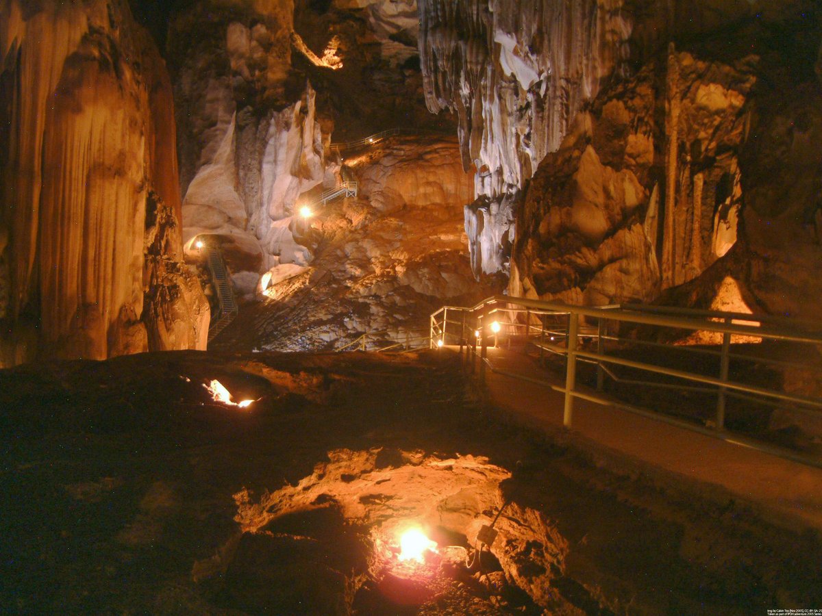 We're going spelunking tonight to Tempurung Cave in the state of Perak in Malaysia. It's more than 3 km long (just under 2 miles), which makes it one of the longest caves on the Malaysian Peninsula. There has been lights and walkways installed in some areas of the cave.