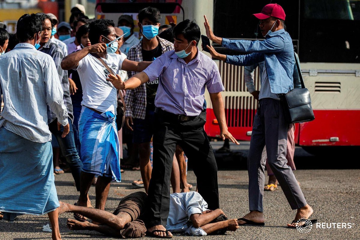 A military supporter points a sharp object as he confronts anti-coup protesters during a military support rally in Yangon, Myanmar, February 25, 2021. 

REJECT MILITARY COUP
#WhatsHappeningInMyanmar 
#Feb25Coup
#MilkTeaAlliance
Please help us
<a href="/BBCWorld/">BBC News (World)</a>
<a href="/UN/">United Nations</a>
m.facebook.com/story.php?stor…