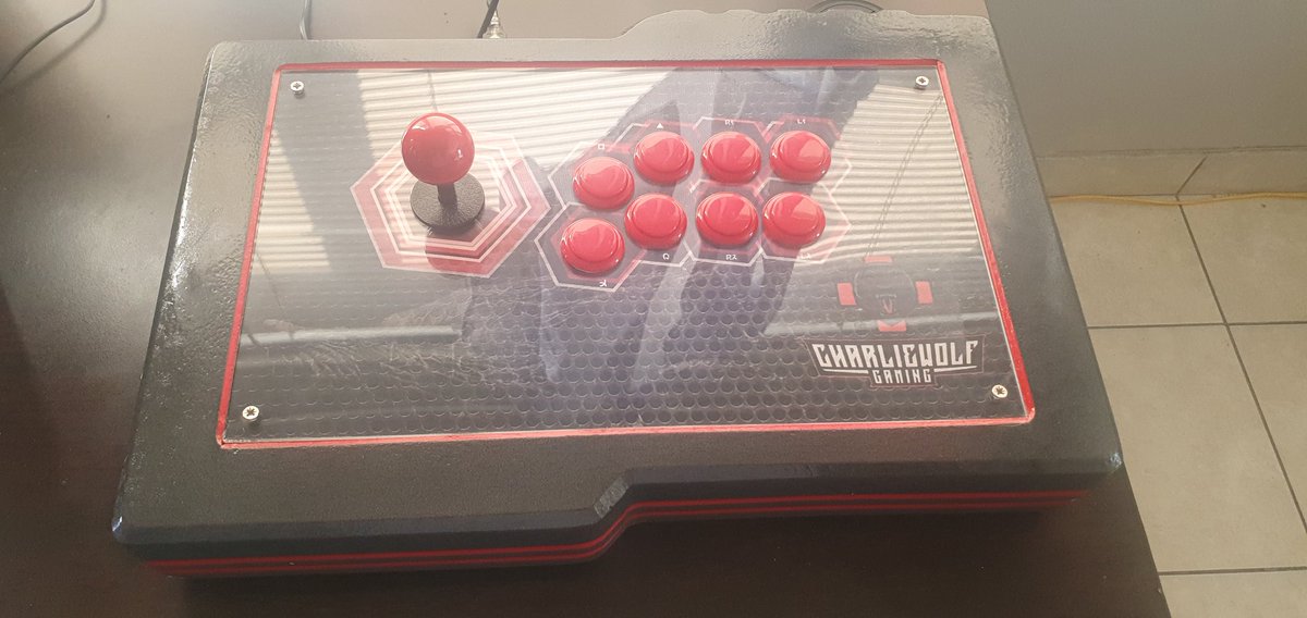CharlieWolfGam1's tweet photo. It's finally arrived Wolfpack. My personalized CharlieWolfGaming fightstick. 

Thanks to @bryanlook @Kentahgoo1 and @Elamac_planG 

Time to open up some new #FGC titles. https://t.co/7WVElMm5Kr