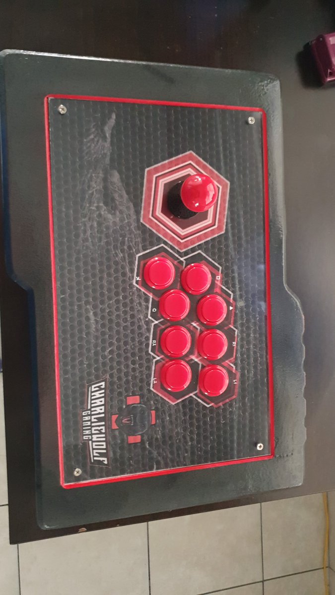 CharlieWolfGam1's tweet photo. It's finally arrived Wolfpack. My personalized CharlieWolfGaming fightstick. 

Thanks to @bryanlook @Kentahgoo1 and @Elamac_planG 

Time to open up some new #FGC titles. https://t.co/7WVElMm5Kr