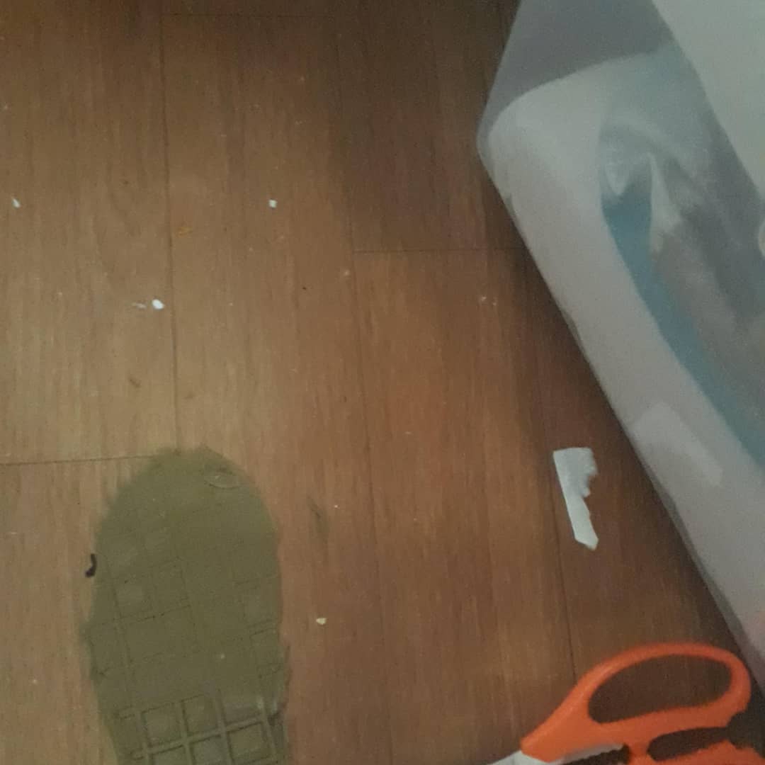 BooksAdela's tweet photo. My slipper melted and fused to the floor.  The cleanup pictures in reverse make it look like I slowly unearthed it like an archaeologist.  Wow. https://t.co/wJ7i9GYLa3