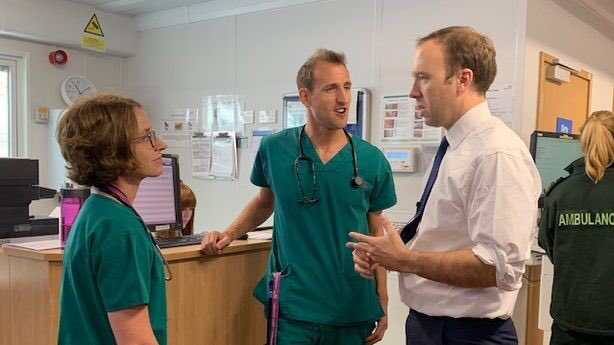 zackferguson's tweet photo. Okay so now obsessed with how all British politicians look like weird awkward medical students whenever they visit a hospital https://t.co/fwKq53XPVv