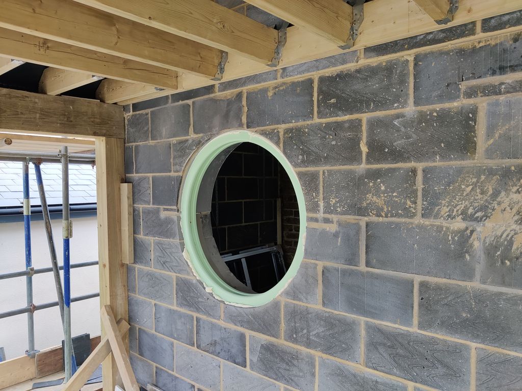 BlinkArch's tweet photo. A porthole and a sea view from our project in #Whitstable. Terrific Progress from BMC Builders - An incredible transformation we cannot wait to share! #Architecture #kent #design #ral6019 https://t.co/J70oYj7nFo