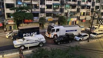 In Tarmwe, Yangon, Myanmar about 15 protesters are arrested by polices in the lock-up cars. About 20 gunshots have been shot now. They  also arrested elder women . Those women didn't nothing those policemen. Why they did like that. Please help and save those people. Please!