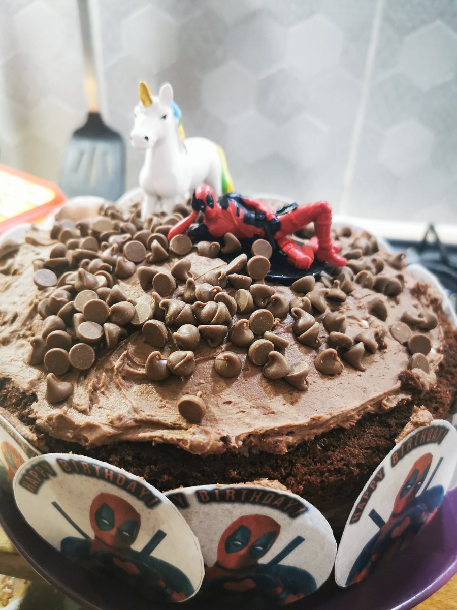 AimeeSetters's tweet photo. My boyfriends birthday was a week ago and I didn't make him a cake π but my step son made chocolate cake the other day, and I've just made the cream and decorated it #Deadpool #Unicorns #homemadecake #birthday #onlyaweeklate https://t.co/ZZvMUuRf7k
