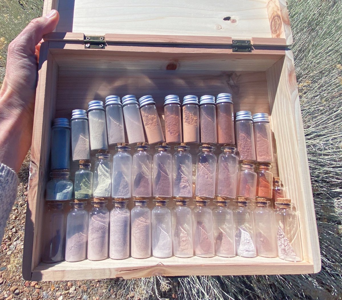 StellaMariaBaer's tweet photo. packing up my studio and meditating on these colors made from dirt and rock. some from near a canyon where my mama took us camping. some from my workshop at Ghost Ranch. each color is a story, a history, a day, a place, a time, a memory and their shadows bleed into one another https://t.co/gbEK3mQvjc