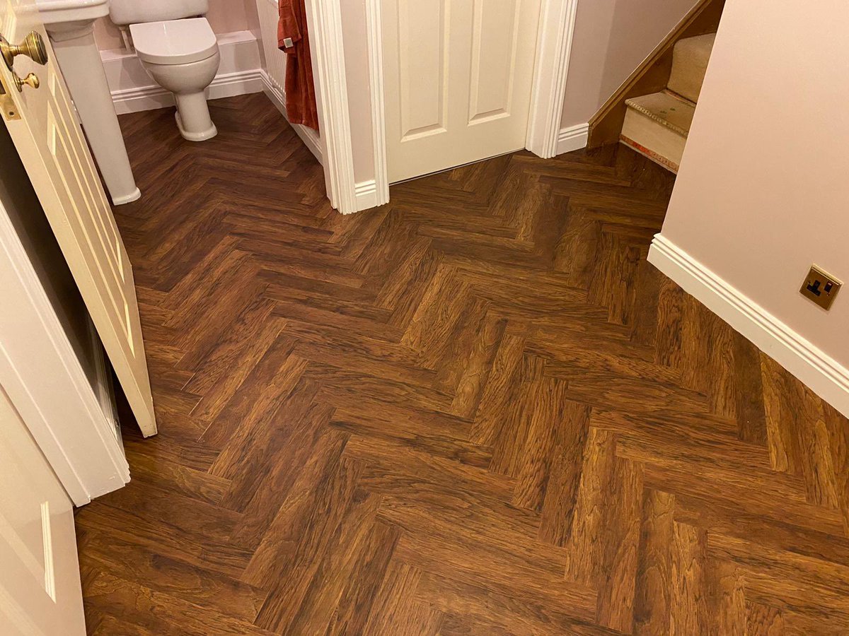 PjmFlooring's tweet photo. Amazing herringbone parquet effect luxury vinyl planks fitted to a hall and W/c. Colour is Distressed Aged Hickory #luxuryvinylspecialists #chestertweets #projectfloors https://t.co/rUtYEF5Oxo