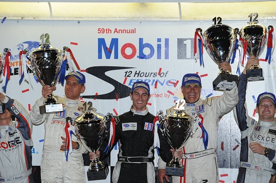 MichelinRaceUSA's tweet photo. #TBT Ten years ago when @SebringRaceway debutante @DaneCameron19 won on his first outing in 2011 in the LMPC class with Mike Guasch and Jens Peterson.

We also spy a pair of @COREautosport drivers either side of DC in that team's debut. 

#IMSA / #Sebring12 https://t.co/4IcKnLCKPH