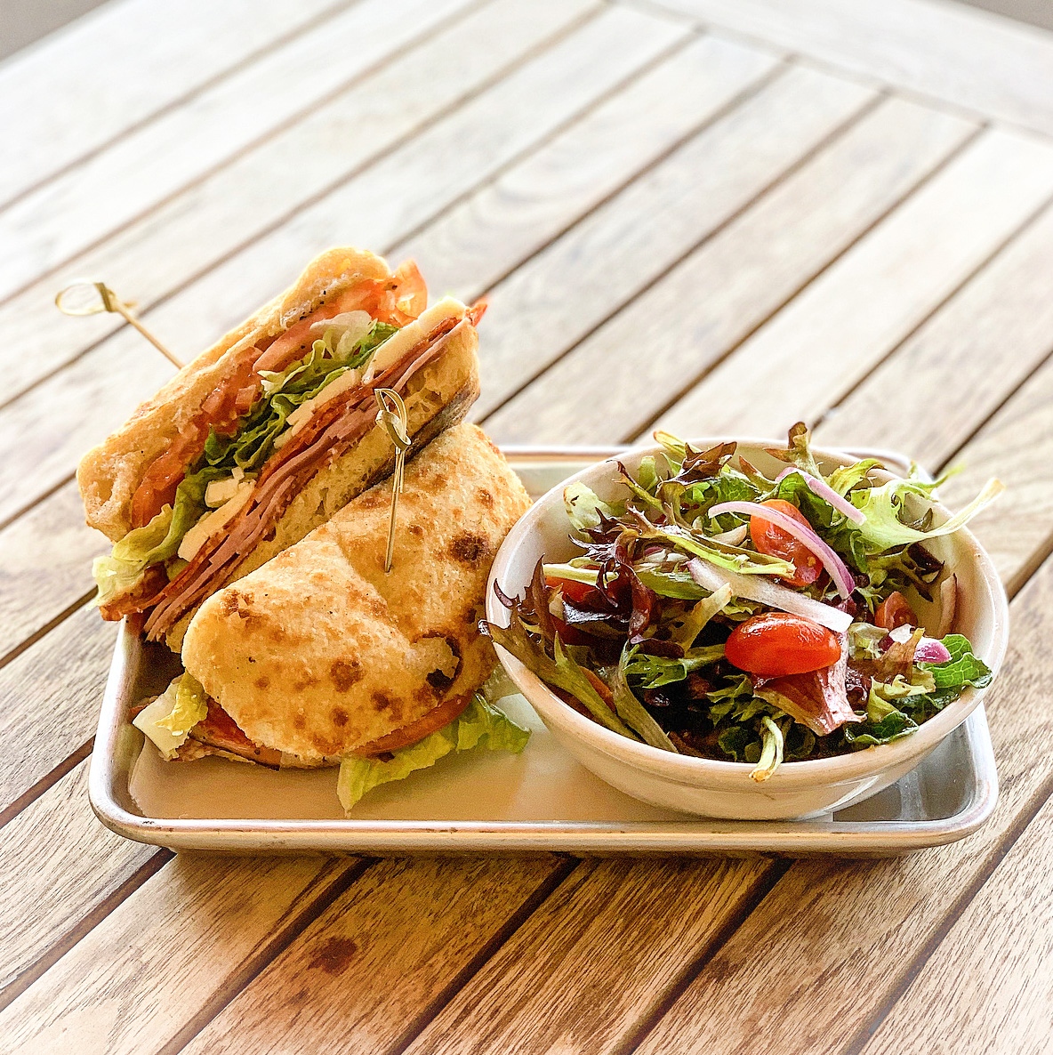 What's our favorite thing about being open for lunch?
 Wood-Fired Panini's!

📸:: The Italian Cold Cut (served cold)
freshly baked bread, genoa salumi, spicy soppressata, ham, lettuce, tomato, red onion, provolone, Italian-citrus vinaigrette