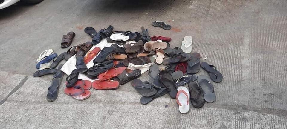 MilkTeaMM_MTAM's tweet photo. This collection of shoes n slippers on the road reveals how horrifying Terroristic Threatening in Tarmwe by Military was. People including press had to frightenedly run away as they fired guns into air many times.

JUNTA BRUTALITY
#Feb26Coup #OpCCP 
#WhatsHappeningInMyanmar https://t.co/g3IR7BA6p9