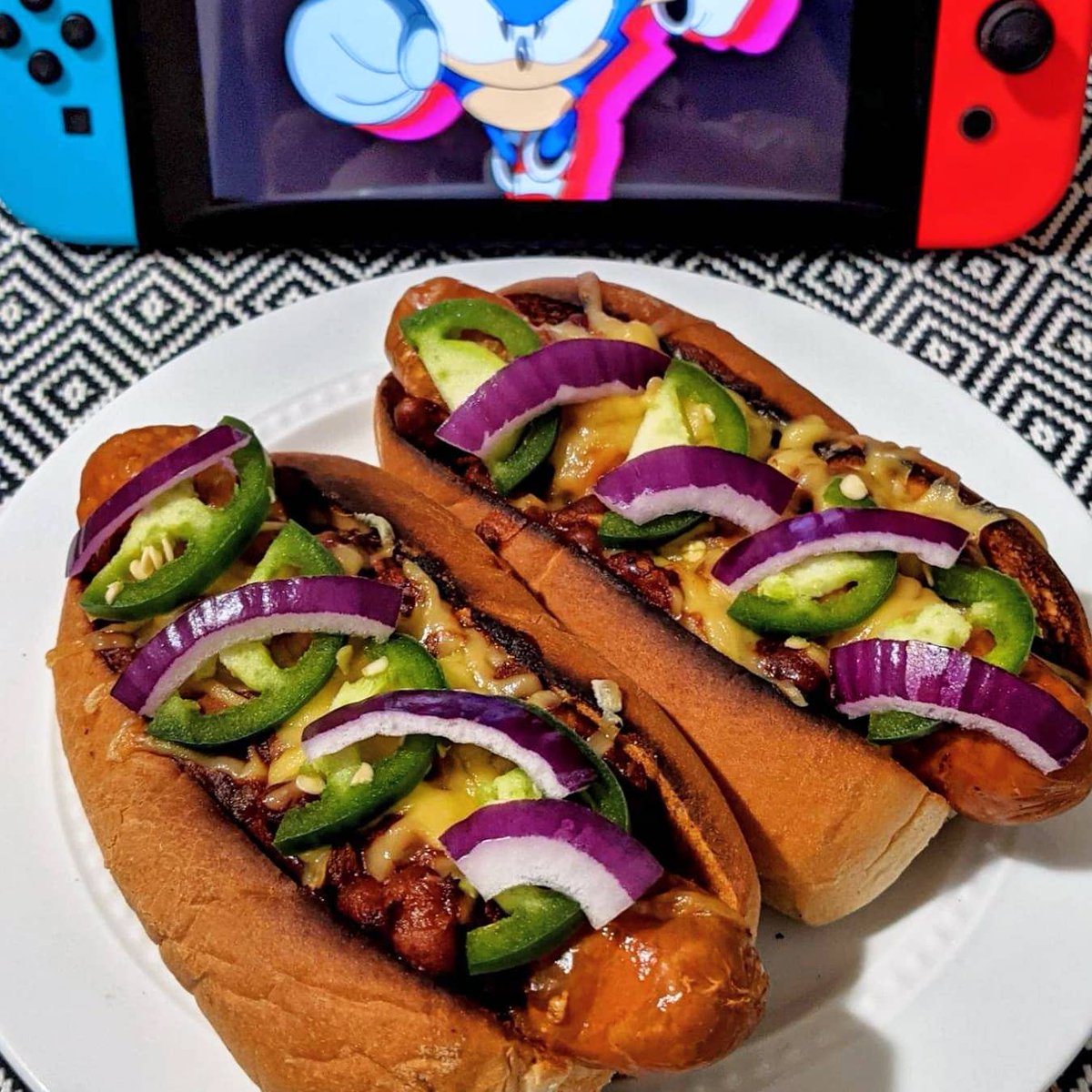 InfinitePantry's tweet photo. CHILI CHEESE DOGS🌭 Today is #NationalChiliDay so we made #vegan chili cheese dogs using @Lightlife dogs and @ViolifeFoods shreds and are going to watch the #Sonic movie! #chilidogs https://t.co/4HufvPDKeQ