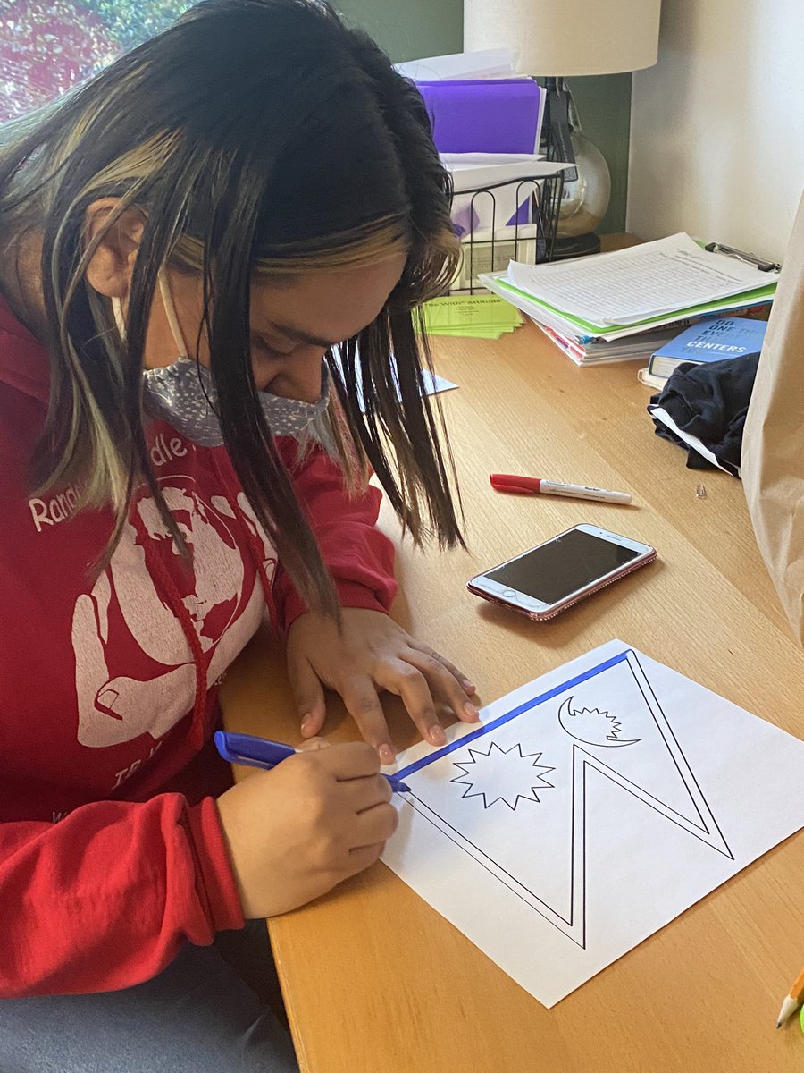 SilGanzo's tweet photo. Prikshya noticed that we were missing the Nepali flag in the room... not cool. She corrected the issue by coloring and hanging the flag herself! @ourBRIDGEkids 🇳🇵 #inclusiveness #LERD https://t.co/cYf4JtYwtH