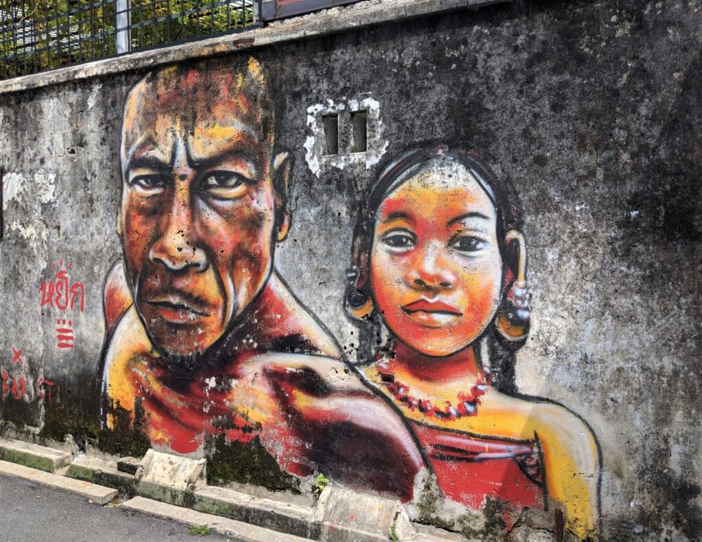 Today we're checking out the Penang Street Art in George Town, Malaysia. There's murals, steel sculptures, and even interactive artworks. As an example, one wall painting is of children riding a bike, but the bike is an actual bike and you can sit on it and get your picture.....