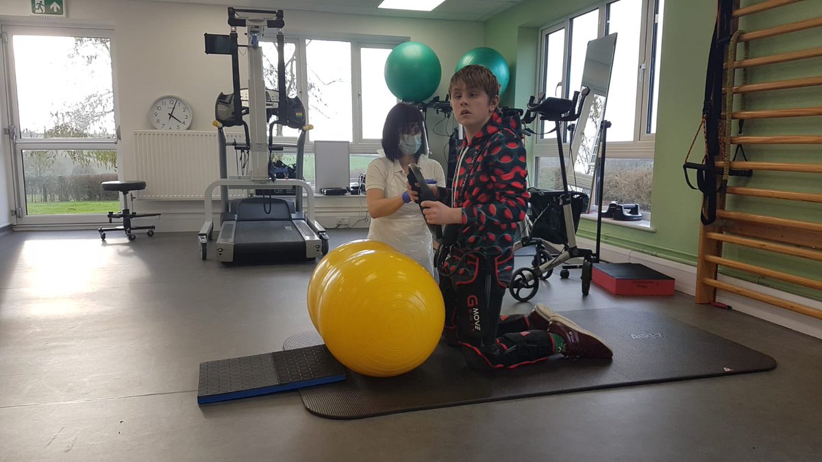 PhysioFunction's tweet photo. Mikey with our Neurological Therapist Claire in our clinic today exercising wearing G-Move. @MikeysWar @DannyGreenFund https://t.co/zyMWwYKsni